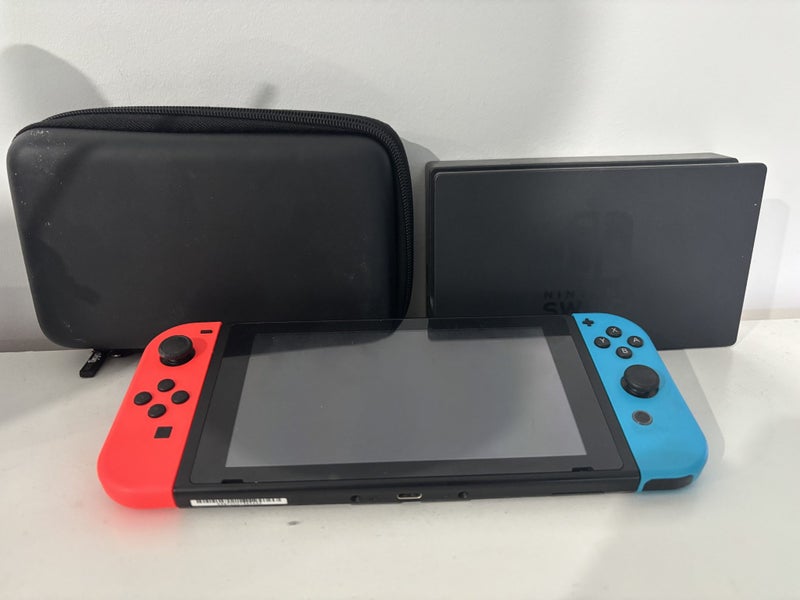 Nintendo Switch Console with dock and hardcase Carousel 1