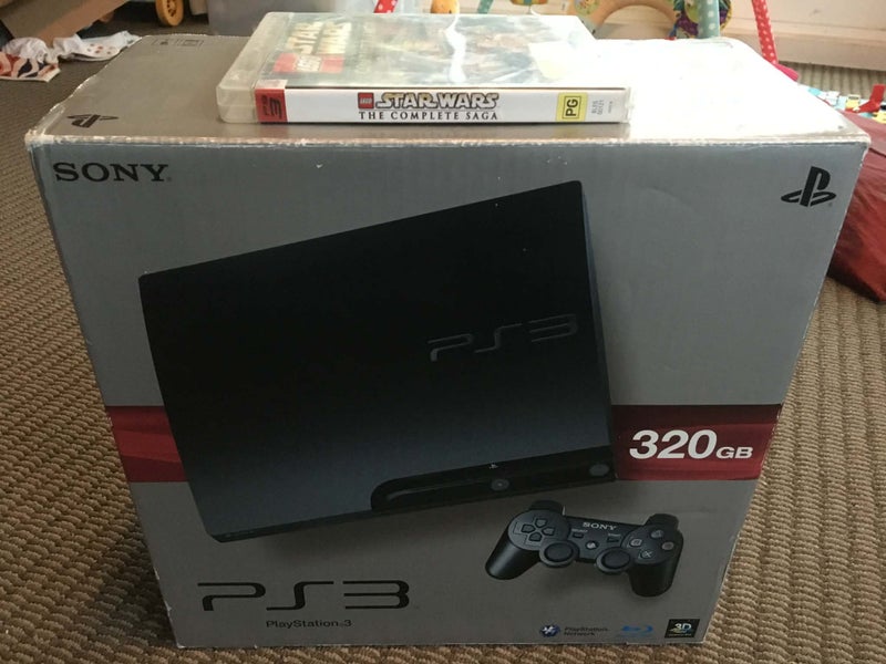 Playstation 3 + Lego Star Wars Game Carousel 1