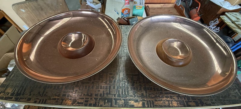 Matching Copper Dishes on Wooden Stands Carousel 5
