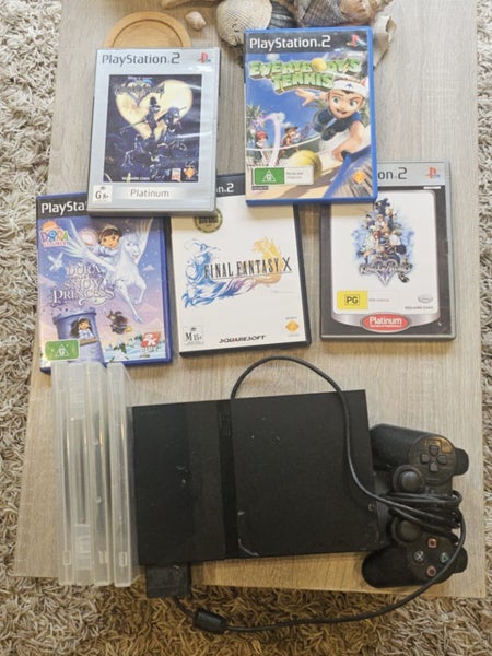 PS2 bundle with games. Carousel 1