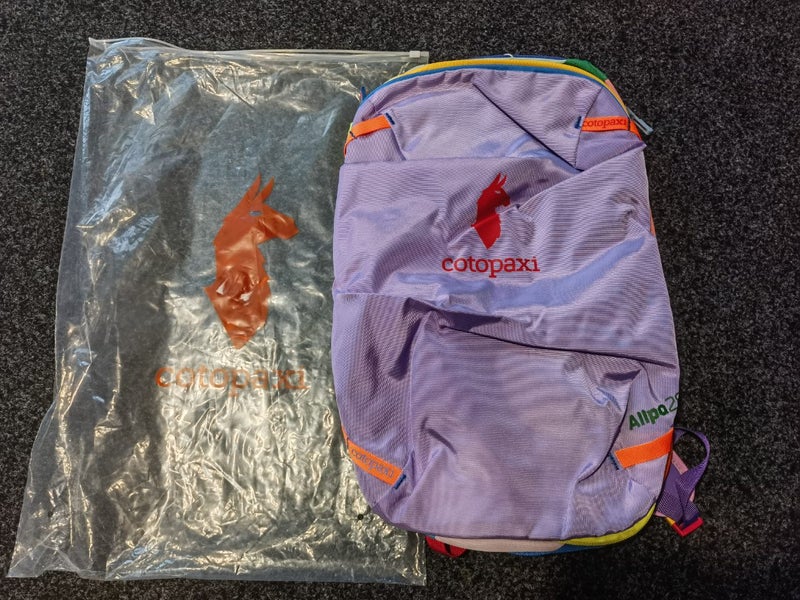 Cotopaxi allpha travel 28L rainbow bacpack brandnew Carousel 1