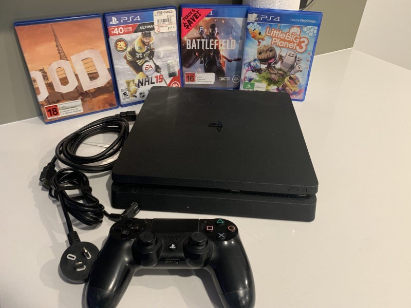 PlayStation 4 slim 1TB +games Carousel 1