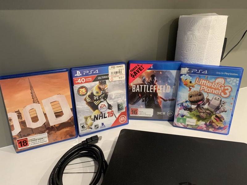 PlayStation 4 slim 1TB +games Carousel 6