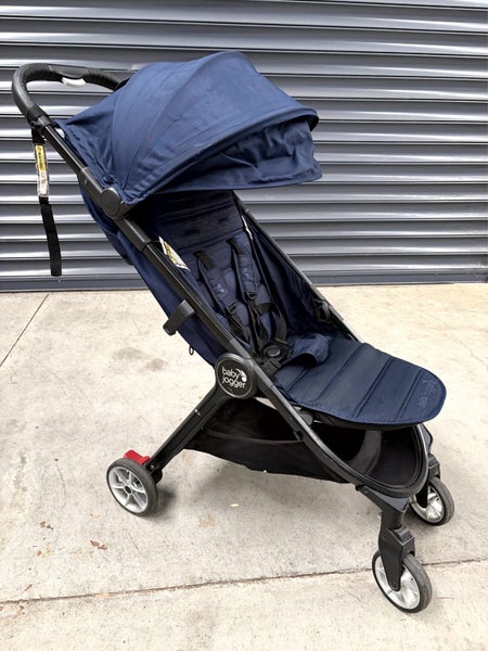 Baby Jogger Compact Travel Stroller – Foldable + Rain Cover + Bag Carousel 1