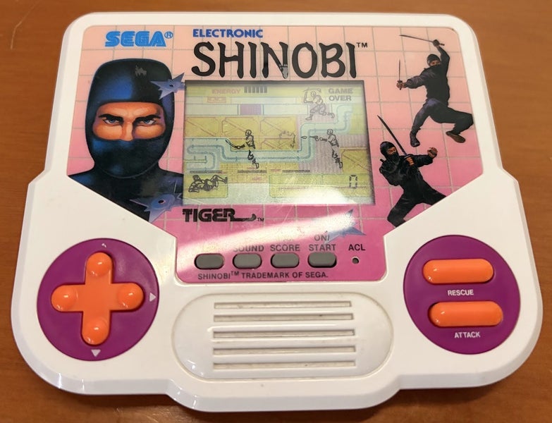 Vintage 1988 Tiger Electronics Shinobi Handheld LCD Game - Sega - Clean! Carousel 1