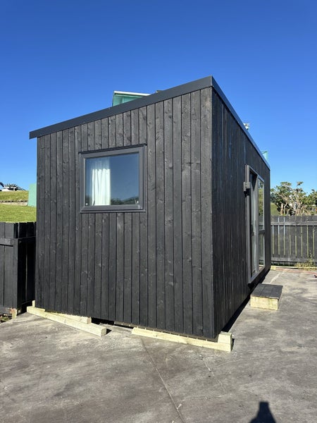 Charred architectural cabin Carousel 18