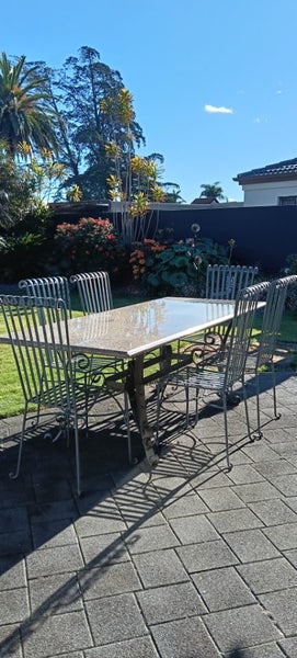 Granite and wrought iron outdoor table, 6x chairs