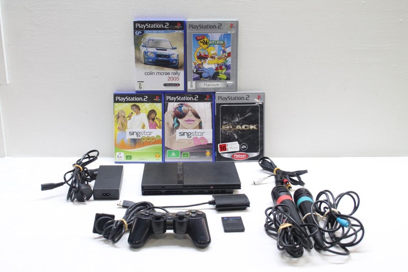 PS2 Package, Games, Mic's & Controller Carousel 1