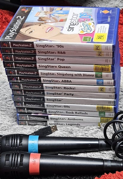 13 x Singstar Playstation 2 & Microphones Carousel 2
