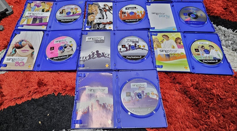13 x Singstar Playstation 2 & Microphones Carousel 7