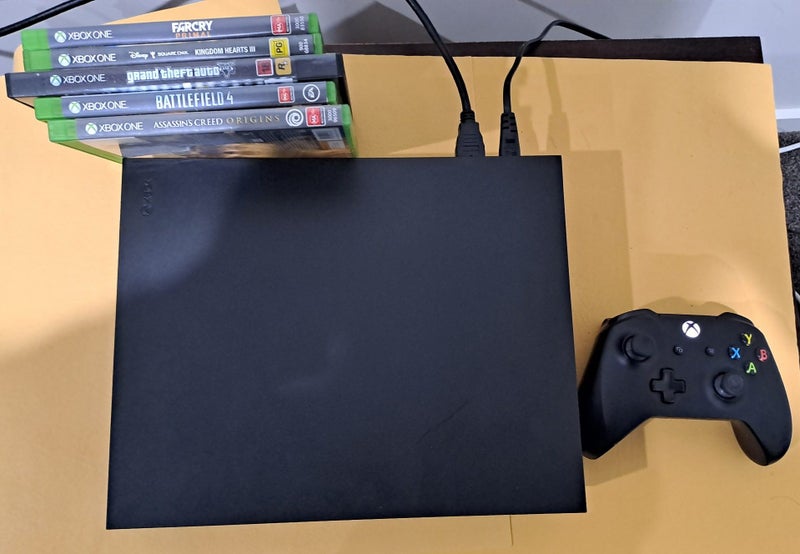 xbox One X 1 TB console controller and 5 games Carousel 1