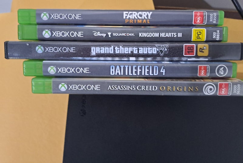 xbox One X 1 TB console controller and 5 games Carousel 4