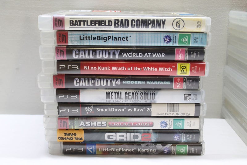 PS3 Slim, 20 Cool Games & Controllers Carousel 8