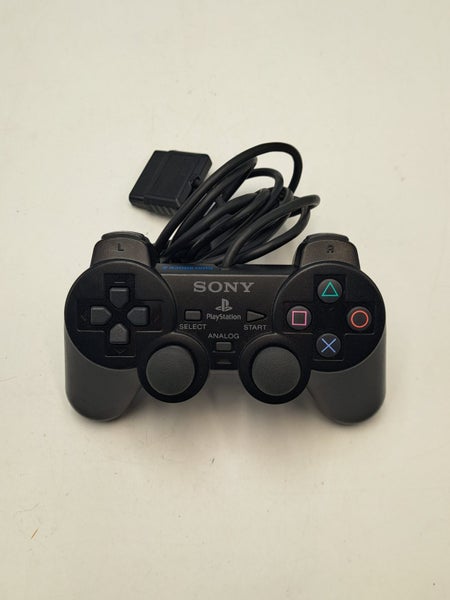 * Genuine OEM Black PS2 Dualshock Controller * Carousel 1