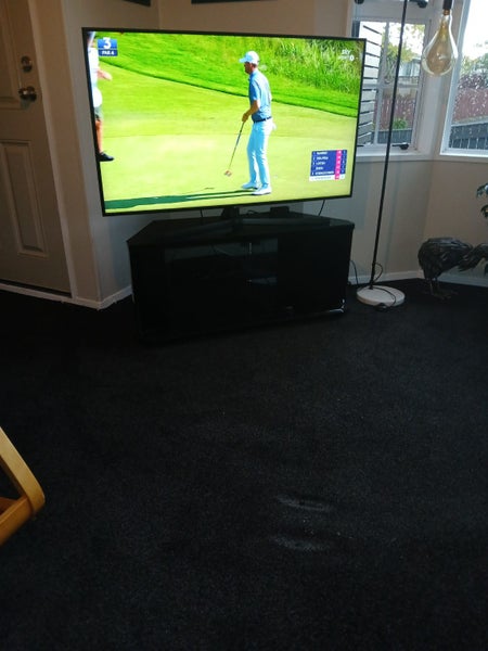 Samsung 55 inch smart TV and cabinet