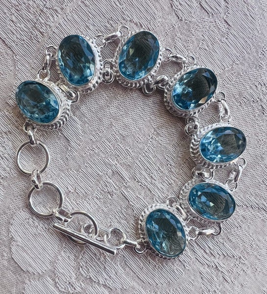 GORGEOUS SIM BLUE TOPAZ AND S/SILVER BRACELET 25 GRAMS *NO RES* Carousel 1