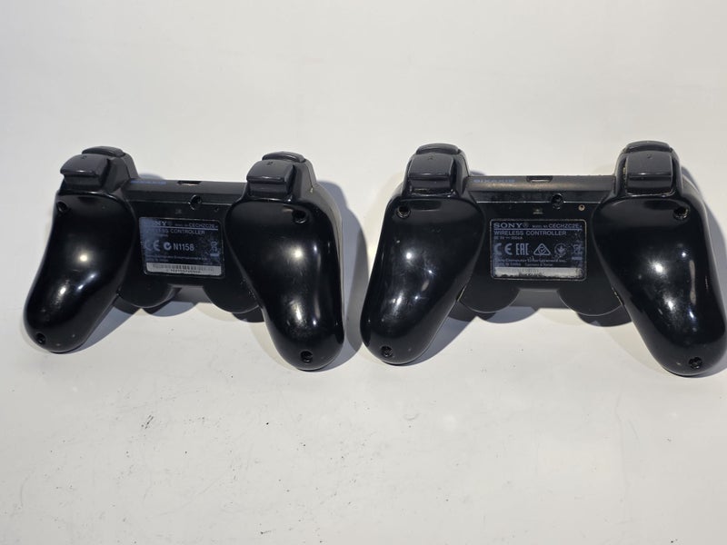 2x Genuine Sony PS3 DualShock3 SixAxis Controllers Carousel 2