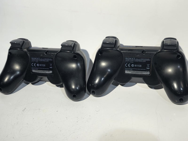 2x Genuine Sony PS3 DualShock3 SixAxis Controllers Carousel 2