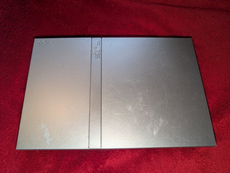 Faulty Silver SLIM PS2 Console Carousel 1