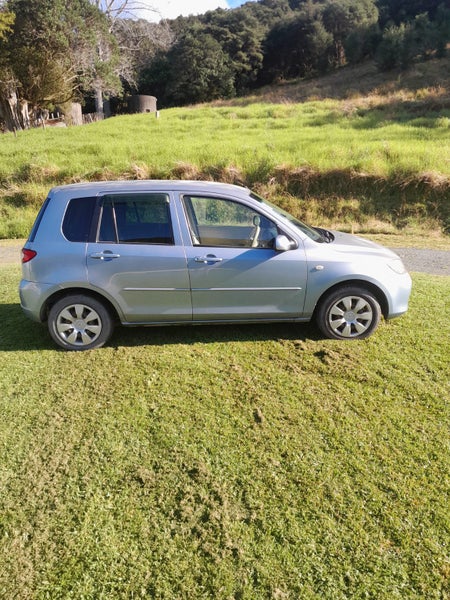 2004 Mazda Demio483776274881597443
