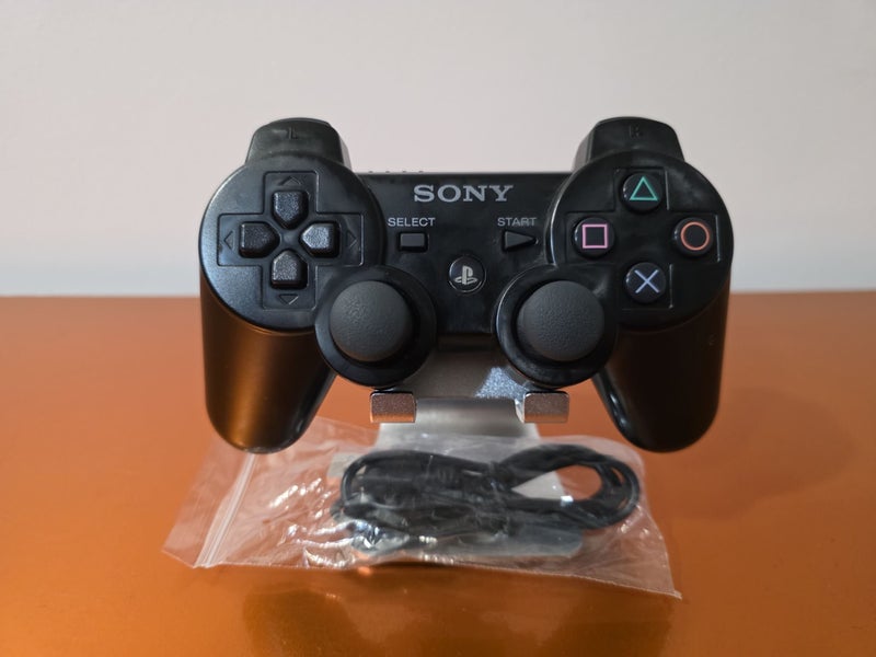 Official Sony PS3 SIXAXIS Wireless Controller with Brand New Charging Cable Carousel 1