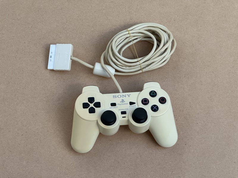 White PlayStation 2 Controller Carousel 1