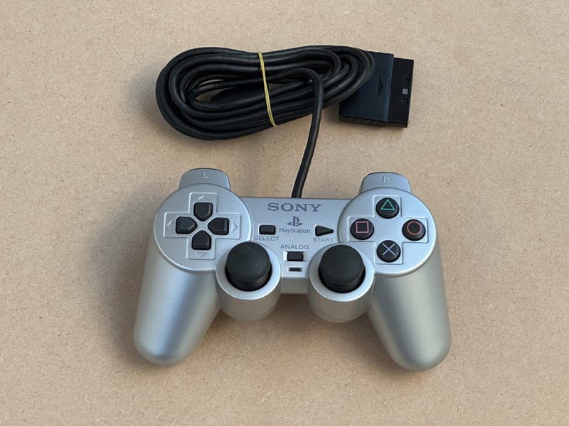 Silver PlayStation 2 Controller Carousel 1