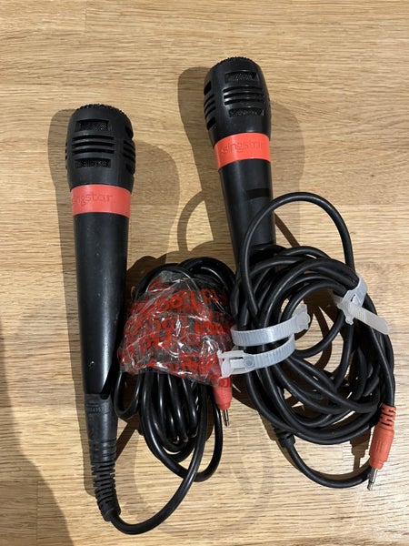 2 x SingStar mics (red) Carousel 1