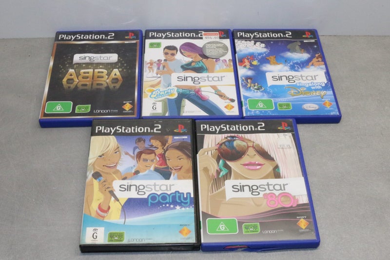 SingStar PlayStation 2 Bundle – Includes 2 Microphones & 5 Games Carousel 3