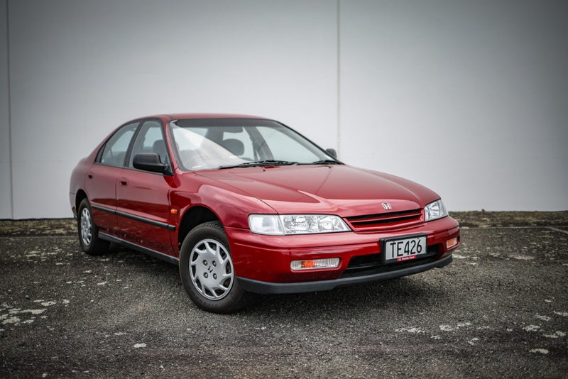 1995 Honda Accord LXi red sedan front three-quarter view