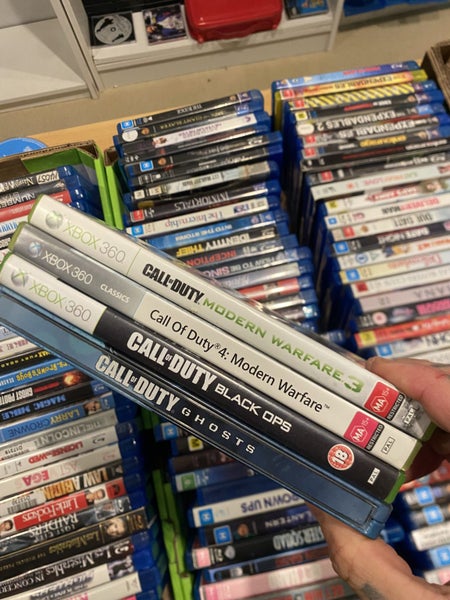 ** bulk buy incl steelcase x 4 CALL OF DUTY Xbox 360 games ** Carousel 1