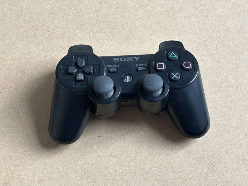 Black PlayStation 3 Controller Carousel 1