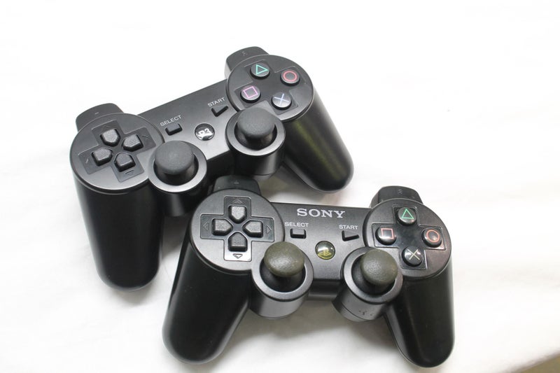 PS3 Slim, 12 Cool Games & Controllers Carousel 2
