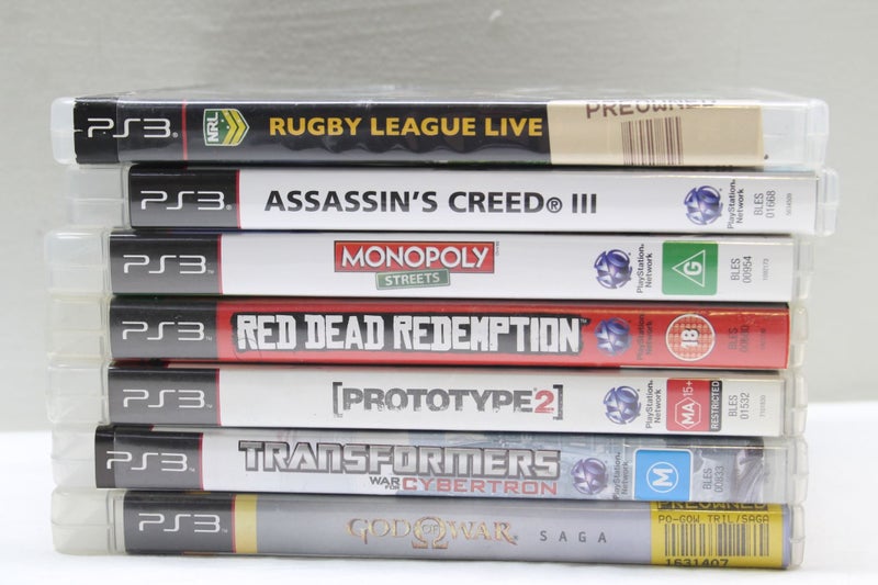 PS3 Slim, 12 Cool Games & Controllers Carousel 7