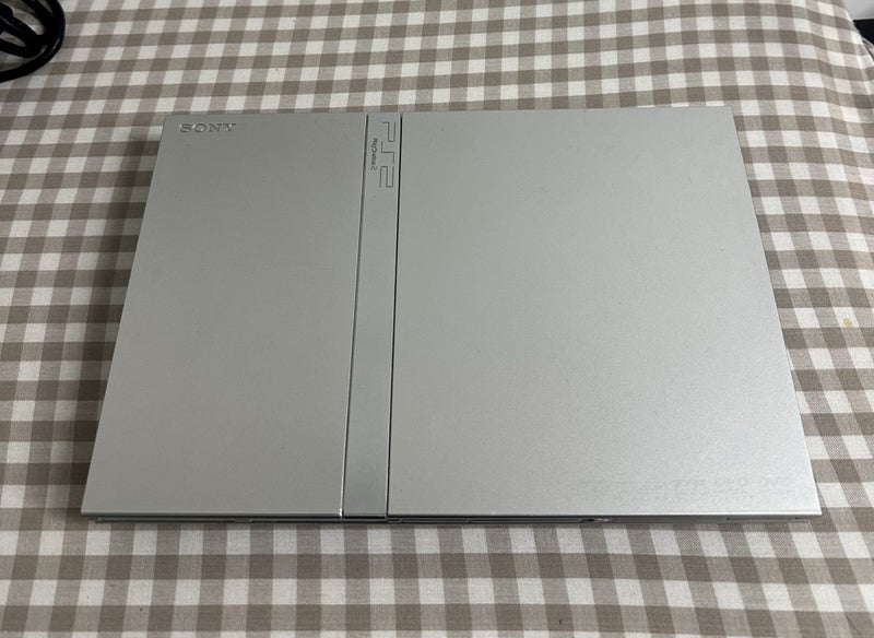 PlayStation 2 Satin Silver Slim | 64GB MX4SIO | HDMI | Genuine Sony Controller Carousel 2