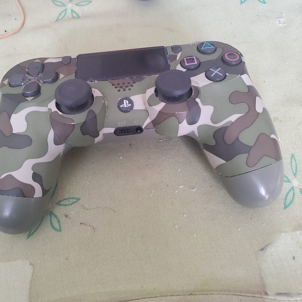 Sony DualShock 4 Wireless Controller in a green camouflage design Carousel 1