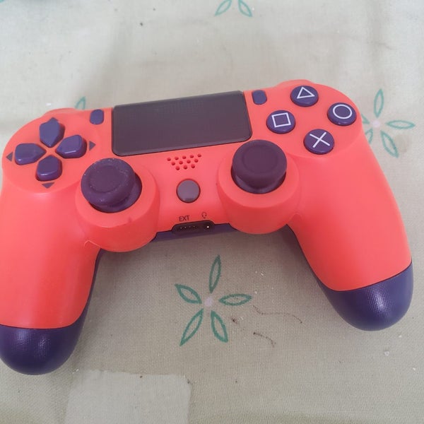PlayStation 4 DualShock 4 Wireless Controller in the "Sunset Orange" special edi Carousel 4