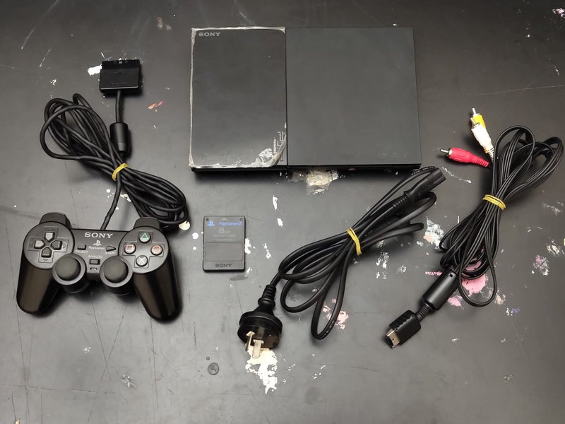 PlayStation 2 Slim (PS2) Console + 4 Games Carousel 1