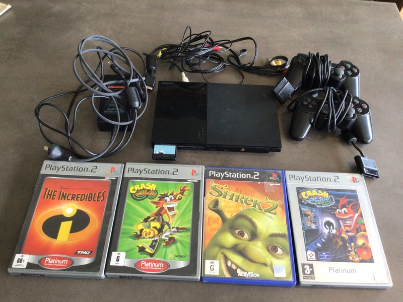 PlayStation 2 Slim Console, cables, games Carousel 1