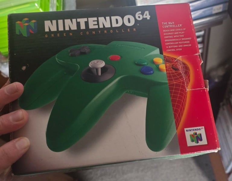 Boxed green N64 controller Carousel 1