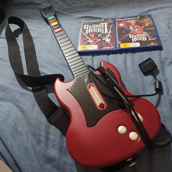 Rare Near New Guitar Hero Bundle for PS2! Carousel 1