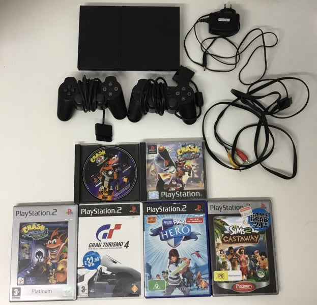 Play Station 2 (PS2) Console + 6 Games and Memory Card Carousel 1