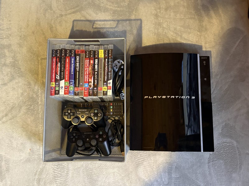 PlayStation 3 80GB Hard drive complete with games . Carousel 1