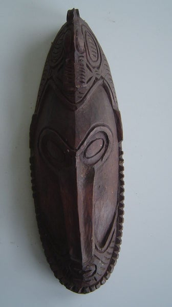 Ethnic Mask Dark Brown Carousel 1