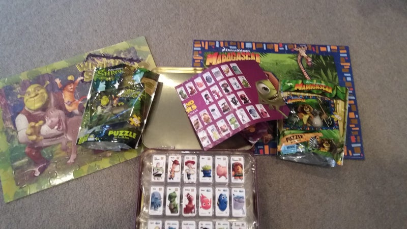 SHREK MADAGASCAR PUZZLES AND DISNEY DOMINOES Carousel 1