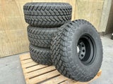 Set of 15X10 steel rims with 33X12.5R15 M/T tyres
