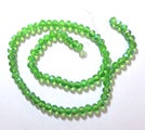 A STRAND OF SPRING GREEN AB 6mm RONDELLE CRYSTALS