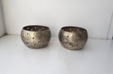a pair of vintage silver plated circle candle bowls