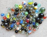 Eighty old glass marbles