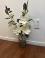 Faux flower bouquet in vase